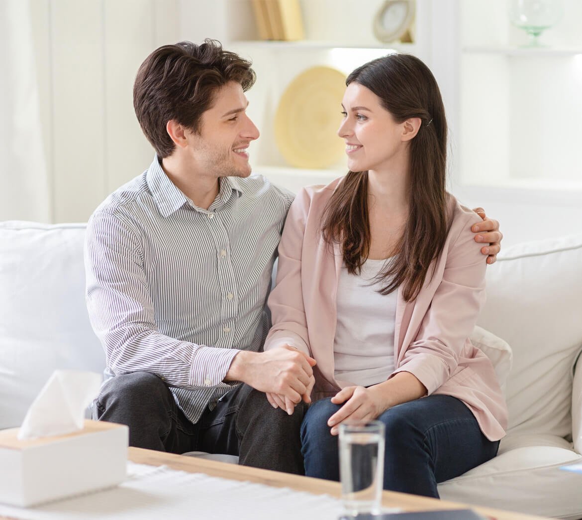 professional-therapist-and-happy-couple-in-office-BF74JD3.jpg