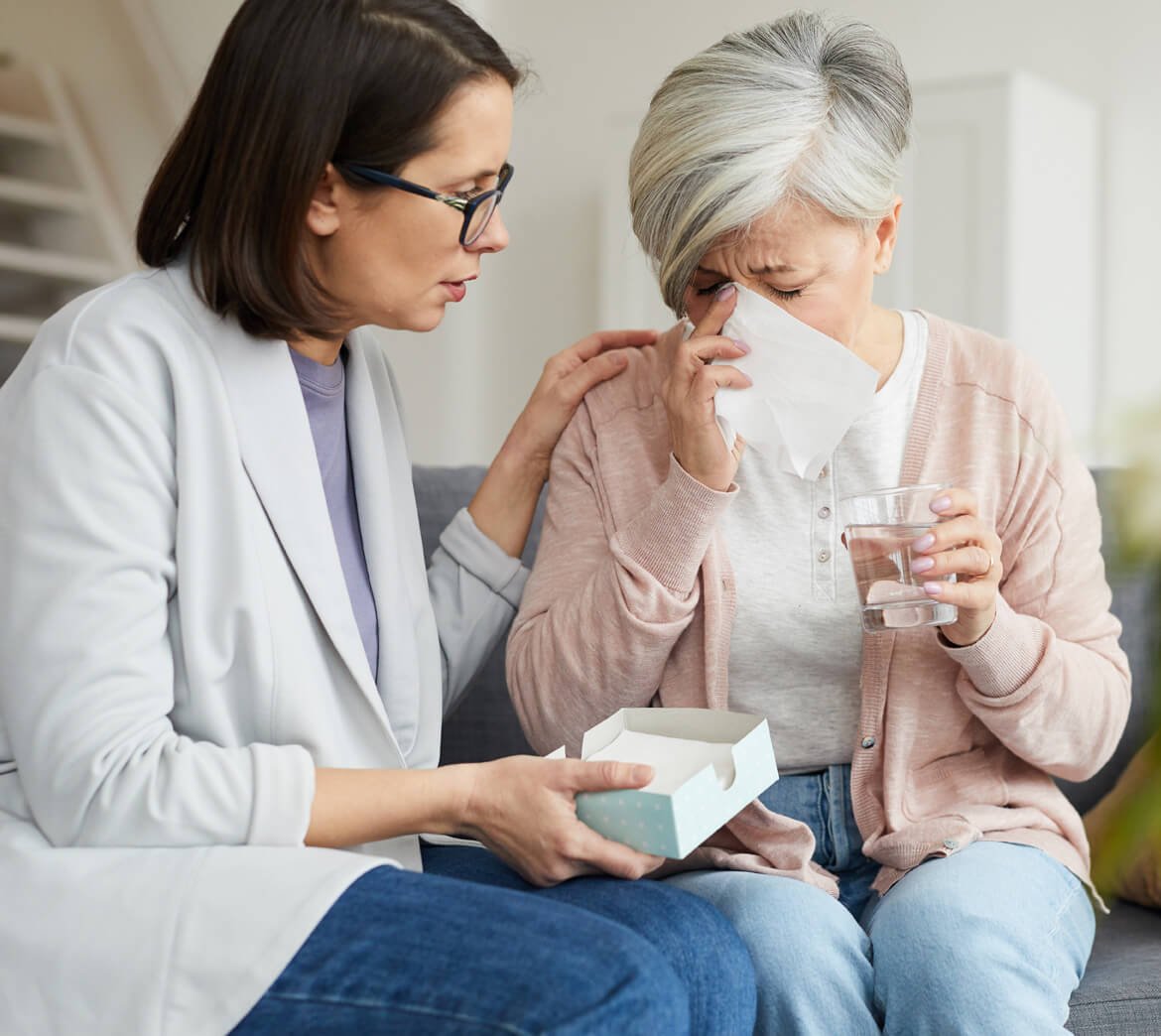 senior-woman-crying-during-therapy-session-SH6GXQ3.jpg
